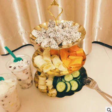 Three-tiered fruit and dessert display 