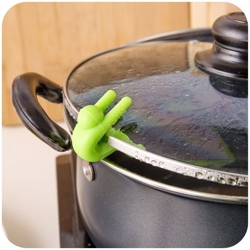 kitchen-utensil-green-spill-guard